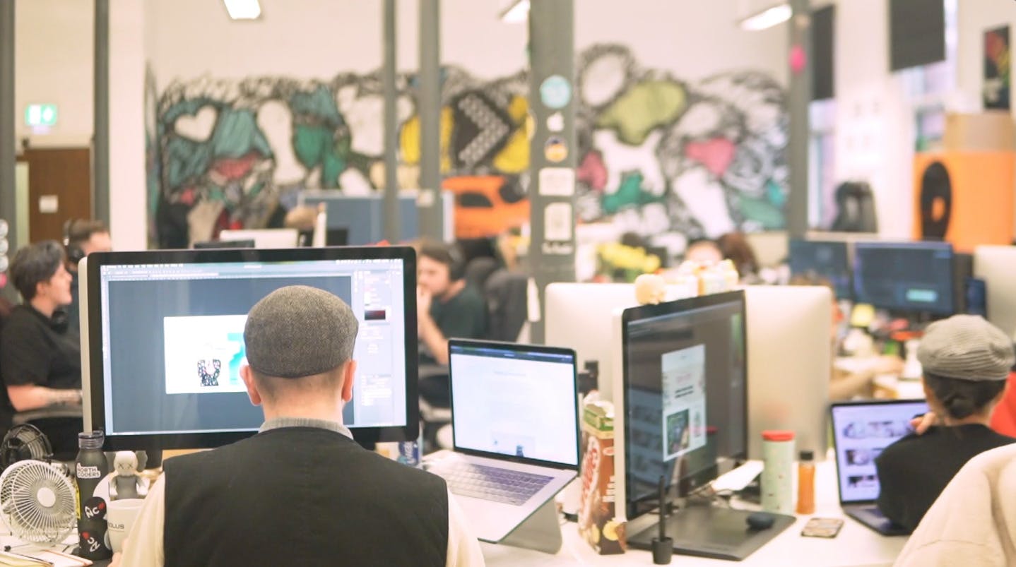 Social Chain employees at desks