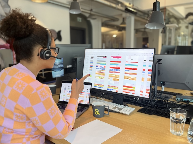 Comfort Agemo points at team schedule in Float